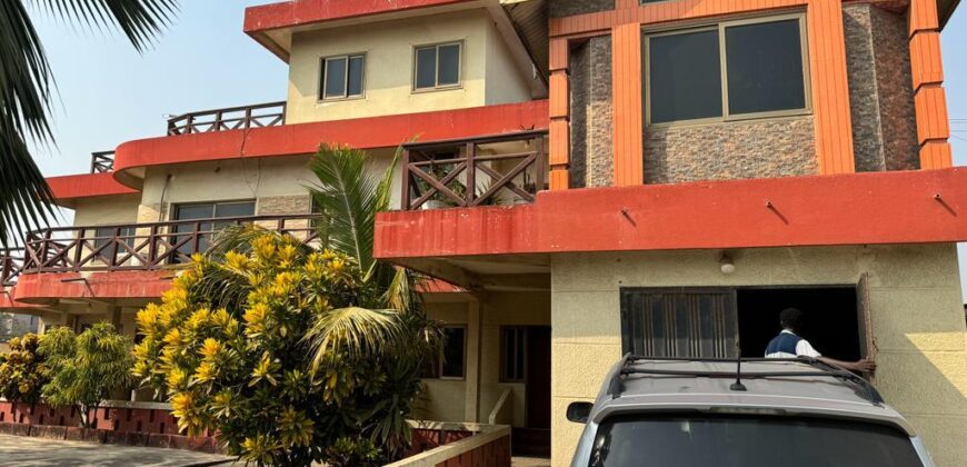 An original 4 bedroom house been partitioned to an 8 bedroom and a penthouse with a 2 bedroom boys quarters for sale Mamprobi