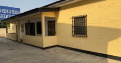 An original 4 bedroom house been partitioned to an 8 bedroom and a penthouse with a 2 bedroom boys quarters for sale Mamprobi