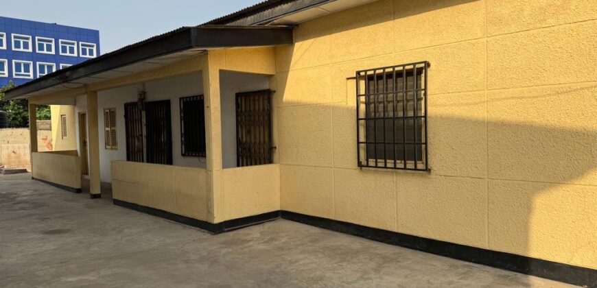 An original 4 bedroom house been partitioned to an 8 bedroom and a penthouse with a 2 bedroom boys quarters for sale Mamprobi