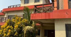 An original 4 bedroom house been partitioned to an 8 bedroom and a penthouse with a 2 bedroom boys quarters for sale Mamprobi