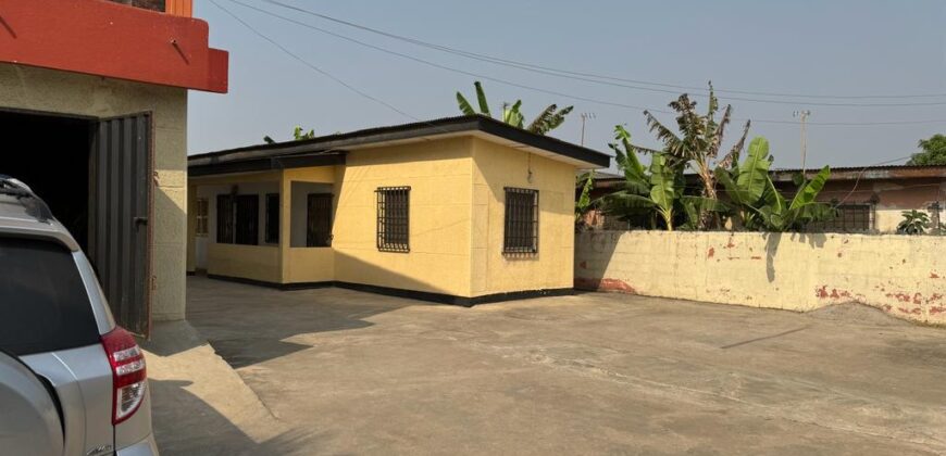 An original 4 bedroom house been partitioned to an 8 bedroom and a penthouse with a 2 bedroom boys quarters for sale Mamprobi