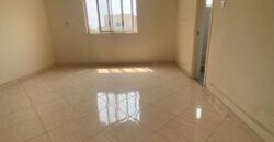 A very spacious and neat unfinished 1 bedroom apartment available for rent at tse Addo