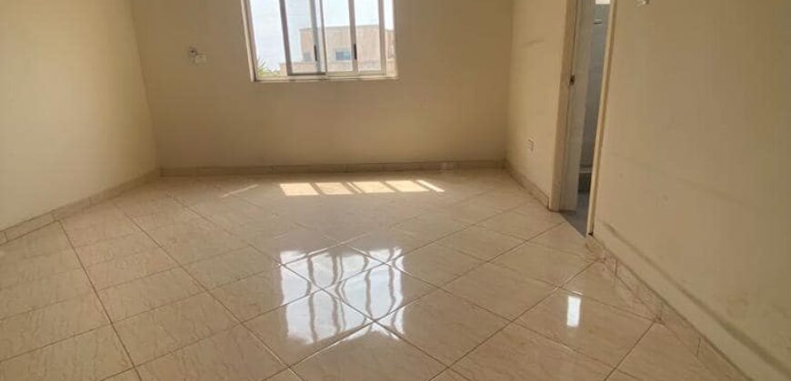 A very spacious and neat unfinished 1 bedroom apartment available for rent at tse Addo