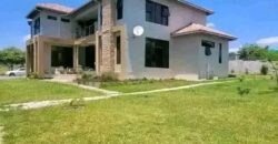 4 Bedroomed Executive Double Storely House For Sale in State Lodge Off Leopard’s Hill Road. Road frontage