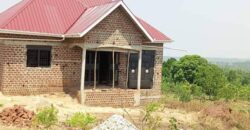 2 BEDROOM SELFCONTAINED WITH 2 ACRESOF LAND FOR SALE AT UGANDA-KAPEEKA