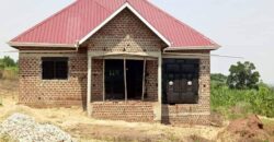 2 BEDROOM SELFCONTAINED WITH 2 ACRESOF LAND FOR SALE AT UGANDA-KAPEEKA