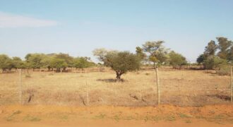 1,370sqm empty fenced plot with title deed