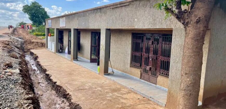 2HOUSES 1 UNFINISHED HOUSE AND 6 SHOPS FOR SALE IN LILONGWE AREA 49 SHIRE ALONG TARMAC ROAD