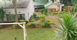 COLONIAL HOUSE FOR SALE AT ZOMBA CITY ITS A BEAUTIFUL AND FULLY TILES AND CEILING.