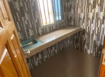 Newly Constructed Room Kitchen and toilet with a private balcony,fenced compound and constant water flow.  