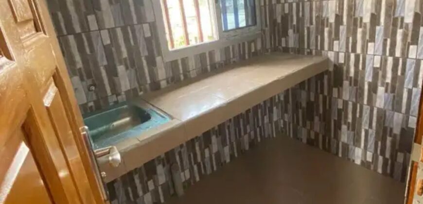 Newly Constructed Room Kitchen and toilet with a private balcony,fenced compound and constant water flow.  