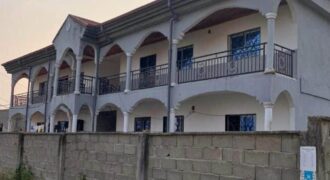 A breaking 4apartments house behind Biaka university in a busy Commercial area, each apartment.